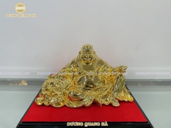 Tượng di lặc cầm thỏi vàng mạ vàng