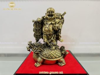 Tượng Di Lặc cưỡi long quy bằng đồng vàng giả cổ